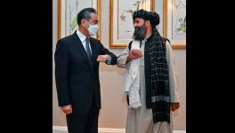 Chinese State Councilor and Foreign Minister Wang Yi met Acting Taliban Dy Prime Minister Mullah Baradar, Doha, Oct. 255, 2021 