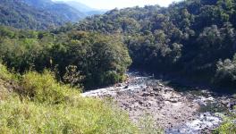 A view of the Namdapha Tiger Reserve near its eastern end with the Noadihing river cutting across. The forests have some of the northernmost evergreen forests in the world.