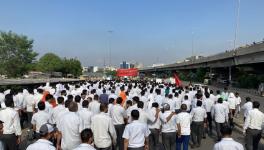 Industrial workers march in Gurugram on Monday, demanding withdrawal of false cases in the 2012 Maruti violence case. Image clicked by Ronak Chhabra