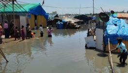 Waterlogged Munnekolala slum / Credit: Twitter