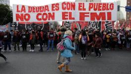 "The debt is with the people, not the IMF" reads a banner in Buenos Aires, Argentina. Photo: AN Red