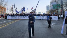 Koreans celebrating the removal of Yoon from his post. Photo: KCTU