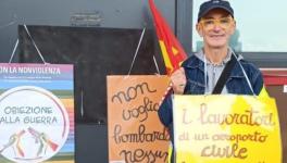 Luigi Borrelli during an action against arms tranfers via civilian transport hubs. Source: USB