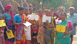 Jobless people of Badulara village of Bankura holding their MGNREGA job cards