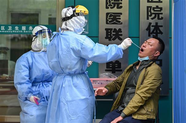 China Revises Coronavirus Figures in Wuhan; Death Toll Jumps to 4,632