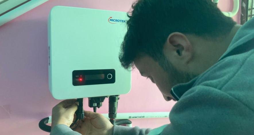 Installing equipment in the house (Photo - Arsalan Bukhari, 101Reporters)