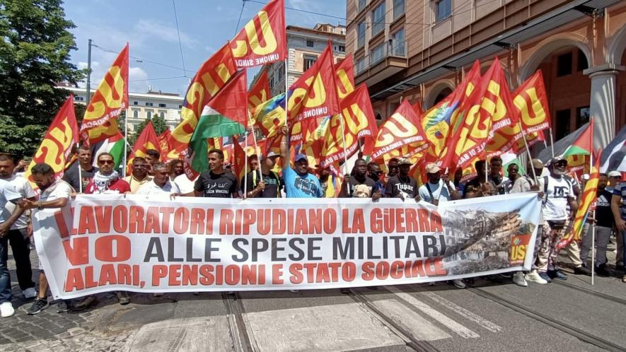 Members of USB march against militarism and for Palestine. Photo: USB/X