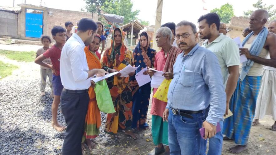 Image: BLOs distribute Enumeration forms to voters in Bhagalpur