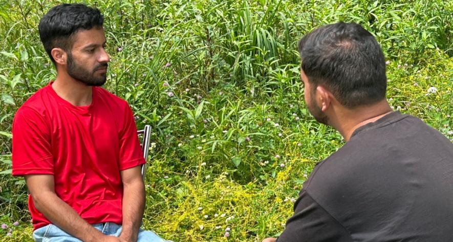 (Right)Reporter on ground, speaking to locals and gathering their perspectives (Photo - Sajid Khan)