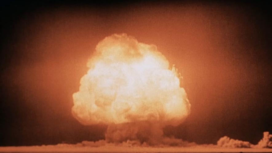 Mushroom cloud over the Trinity testing site, seconds after detonation