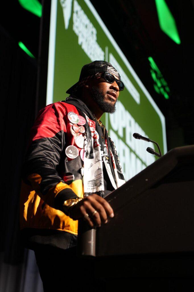 Chris Smalls makes opening remarks (Photo via People’s Conference for Palestine)