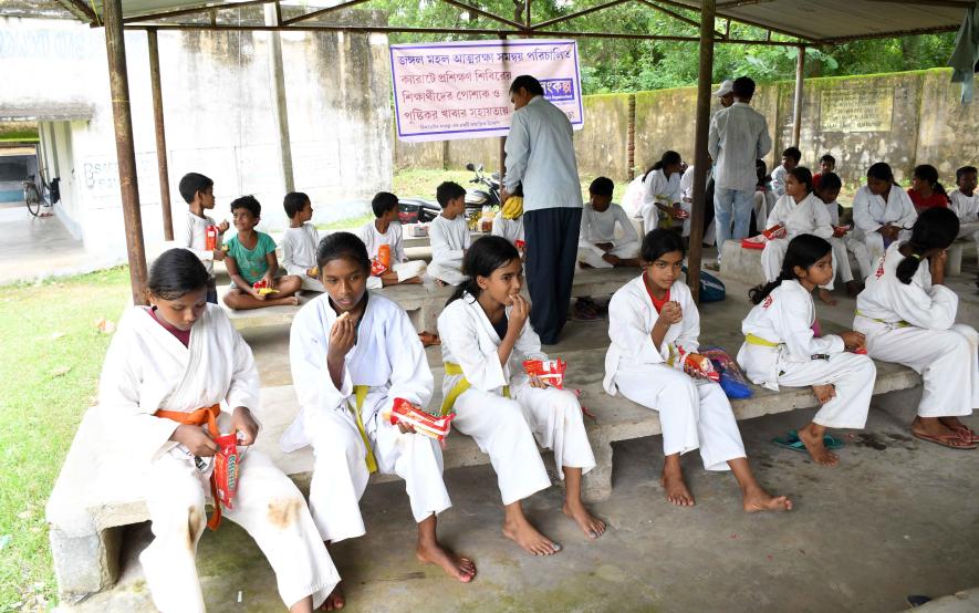 Students having a meal after completing their self-defence session.