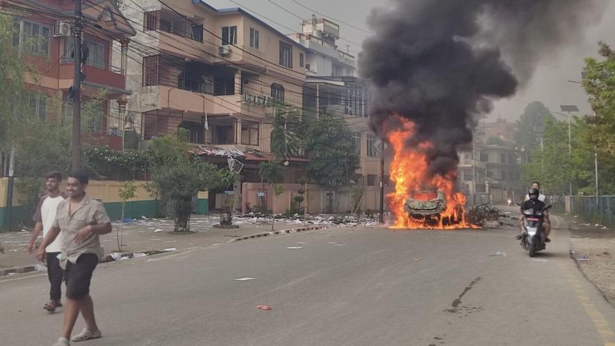 A vehicle was set on fire in front of the office of the CPN (Unified Socialist) in Kathmandu, Nepal on September 9. Photo: Surendra Kandel